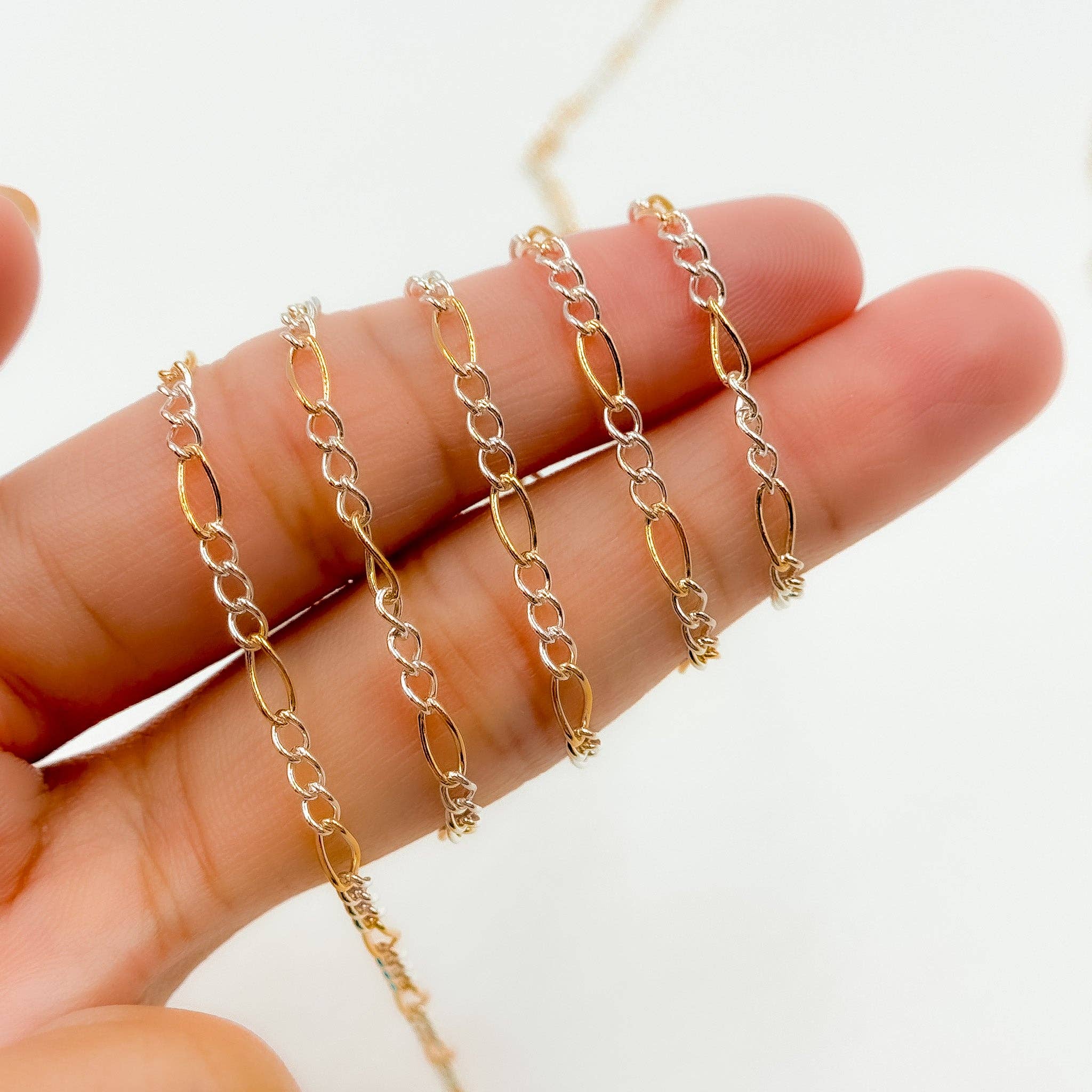 2431CTT. Gold Filled and Sterling Silver Figaro Style Chain